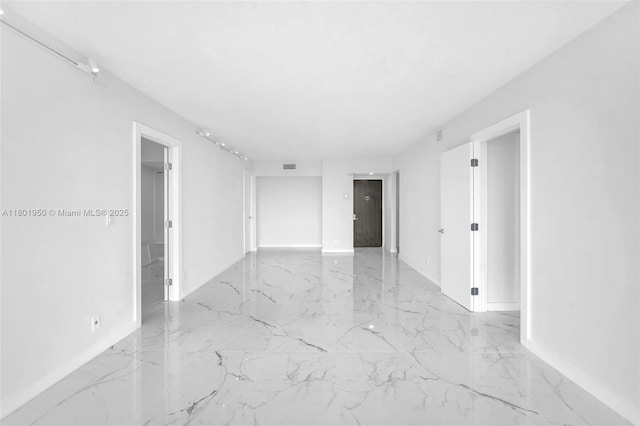 20335 W Country Club Dr Unit 1108, Aventura, FL 33180 - empty room featuring marble tiled floors and baseboards