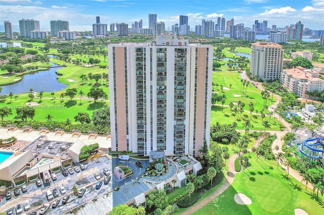 20335 W Country Club Dr Unit 1108, Aventura, FL 33180 - drone / aerial view of a skyline view, a large body of water, a golf course, and apartment complex