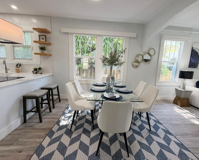 38 NW 47th Ter, Miami, FL 33127 - dining area featuring wood finished floors, baseboards, and recessed lighting