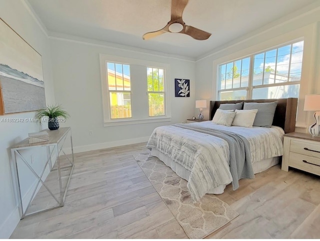 38 NW 47th Ter, Miami, FL 33127 - bedroom featuring light wood-style floors, baseboards, crown molding, and a ceiling fan