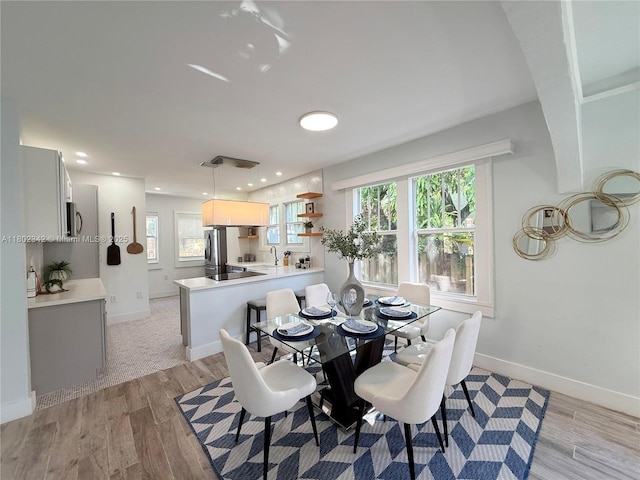 38 NW 47th Ter, Miami, FL 33127 - dining area featuring baseboards, light wood-style floors, plenty of natural light, and recessed lighting