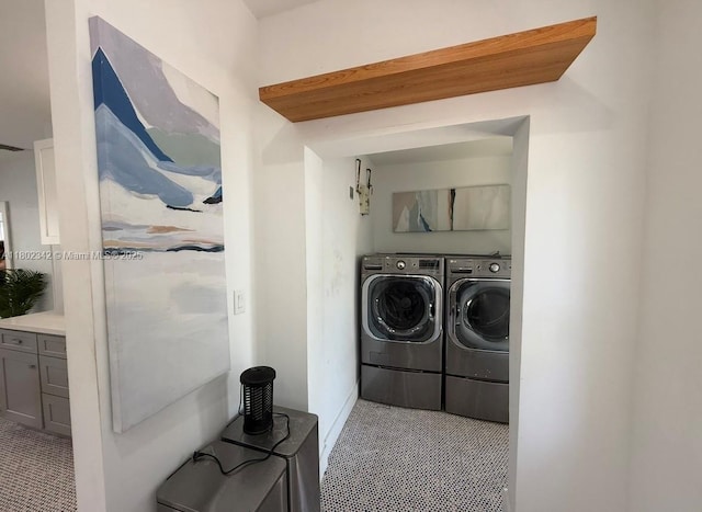 38 NW 47th Ter, Miami, FL 33127 - laundry area with washer and clothes dryer and tile patterned floors