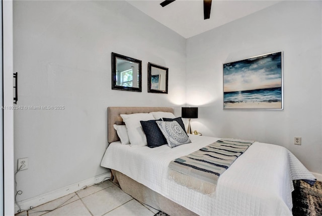 38 NW 47th Ter, Miami, FL 33127 - bedroom featuring baseboards, ceiling fan, and light tile patterned floors