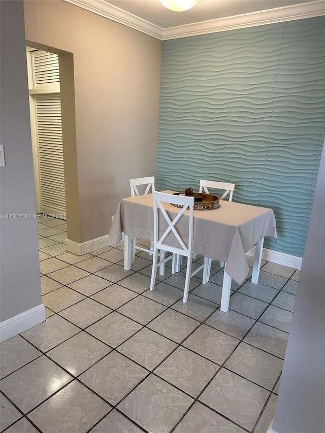 2600 S Ocean Dr Unit S113, Hollywood, FL 33019 - dining space with ornamental molding, baseboards, and light tile patterned floors