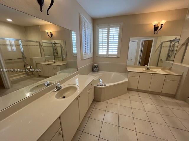 8753 SW 3rd Ln, Miami, FL 33174 - bathroom with a stall shower, a garden tub, tile patterned floors, and two vanities