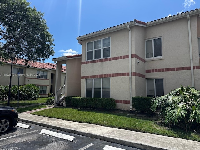 3310 N Pinewalk Dr N Unit 1814, Margate, FL 33063 - view of property with uncovered parking