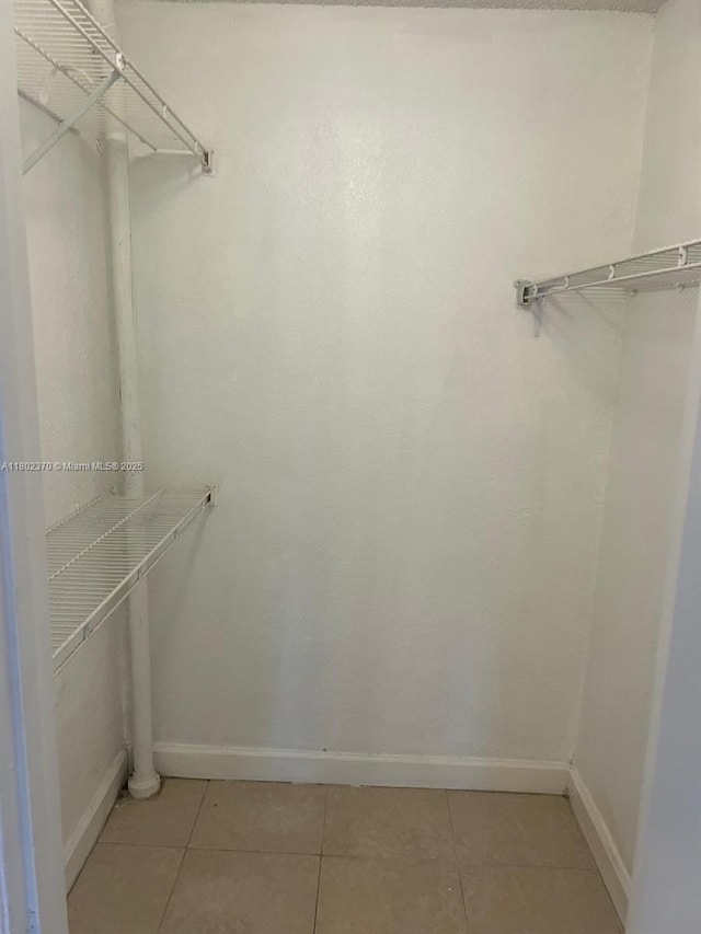 3310 N Pinewalk Dr N Unit 1814, Margate, FL 33063 - walk in closet featuring light tile patterned flooring