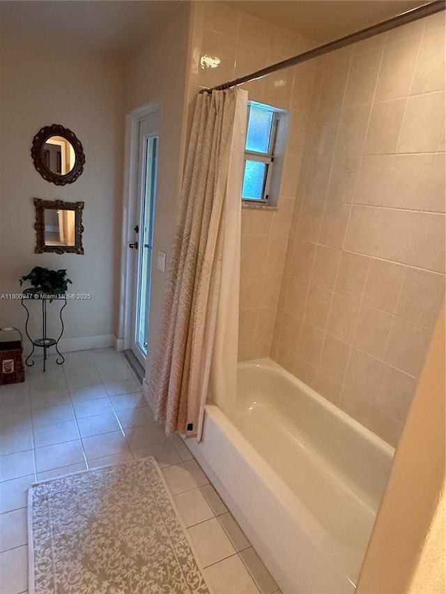 8943 NW 174th St, Hialeah, FL 33018 - bathroom with tile patterned flooring and shower / bath combo