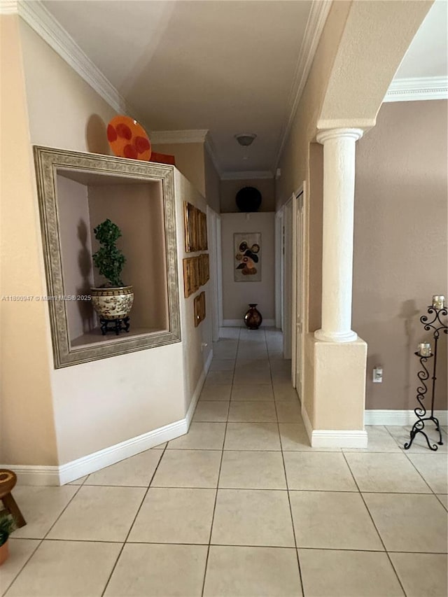 8943 NW 174th St, Hialeah, FL 33018 - corridor featuring decorative columns, crown molding, light tile patterned floors, and baseboards