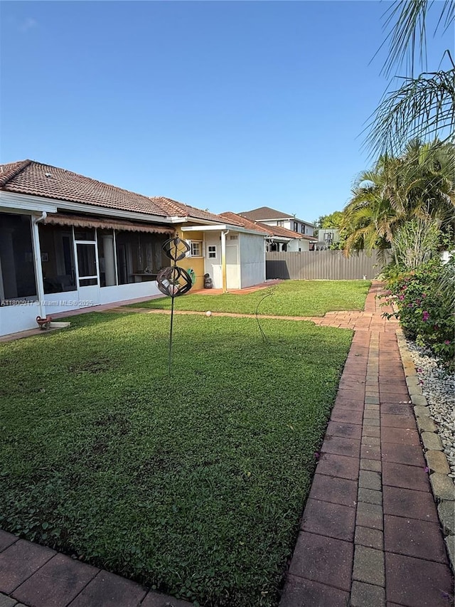 8943 NW 174th St, Hialeah, FL 33018 - view of yard with a sunroom
