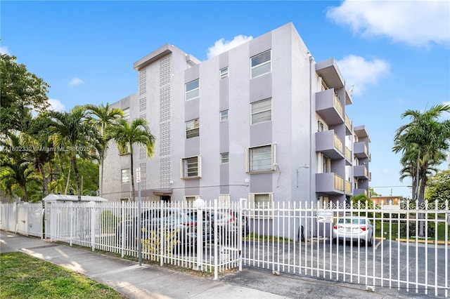 1661 SW 3rd St Unit 8, Miami, FL 33135 - view of apartment building / complex with fence