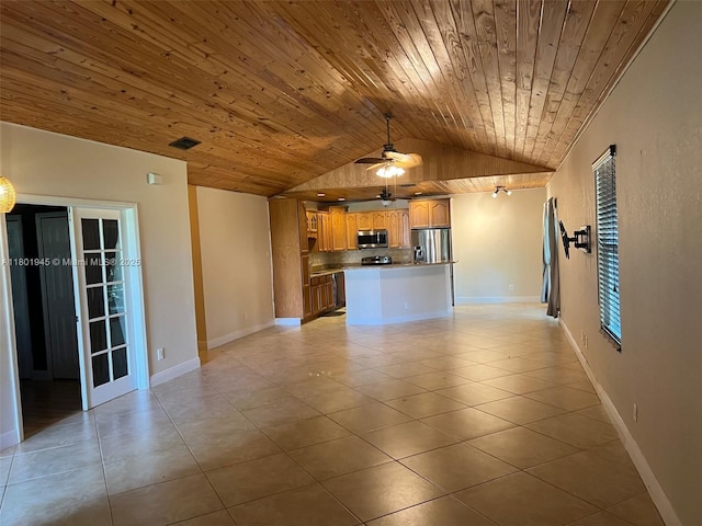 2014 SE Mantua St, Port St Lucie, FL 34952 - unfurnished living room with wooden ceiling, lofted ceiling, light tile patterned floors, a ceiling fan, and baseboards