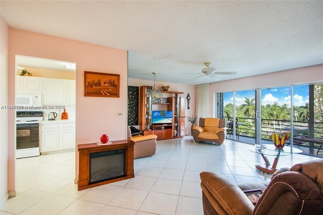 1425 Atlantic Shores Blvd Unit 502, Hallandale Beach, FL 33009 - living room with ceiling fan and light tile patterned flooring