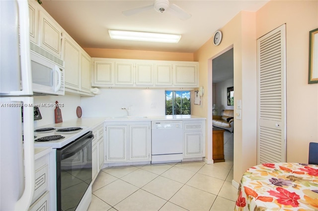 1425 Atlantic Shores Blvd Unit 502, Hallandale Beach, FL 33009 - kitchen featuring white appliances, a sink, light countertops, a ceiling fan, and light tile patterned floors