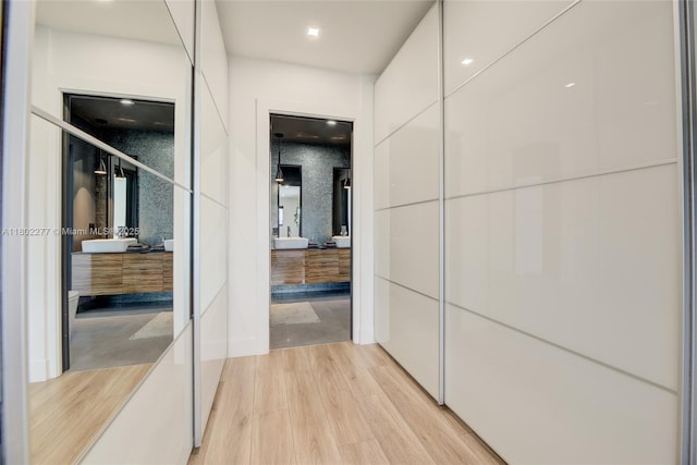 2117 NE 62nd St, Fort Lauderdale, FL 33308 - corridor featuring light wood finished floors and recessed lighting