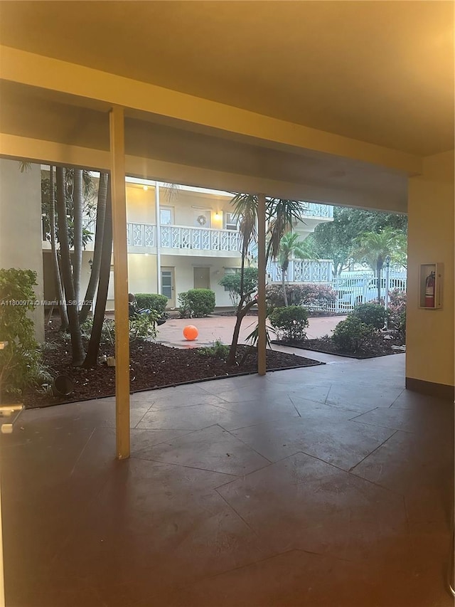 view of patio featuring fence