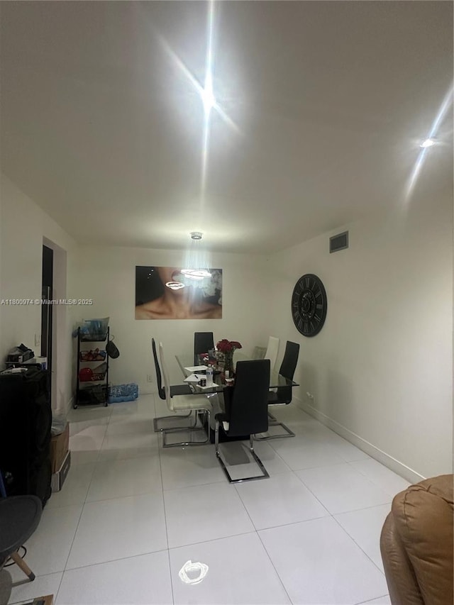 dining room featuring an office area and tile patterned flooring