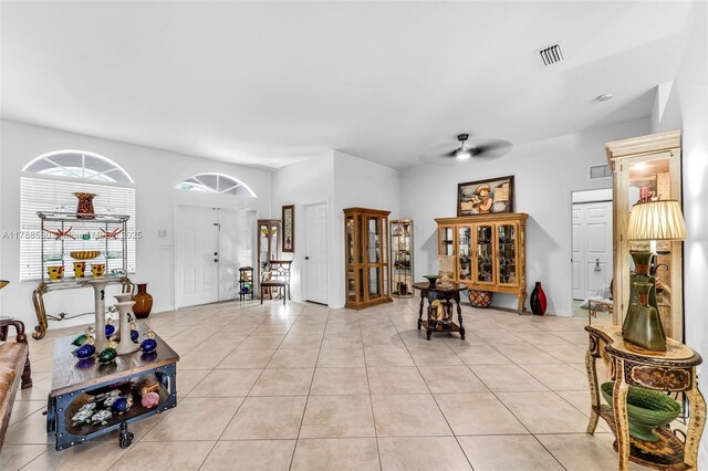 2819 Augusta Ln, Homestead, FL 33035 - living area with light tile patterned floors and a ceiling fan