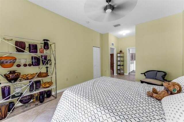2819 Augusta Ln, Homestead, FL 33035 - bedroom featuring light tile patterned floors, a closet, a ceiling fan, and baseboards