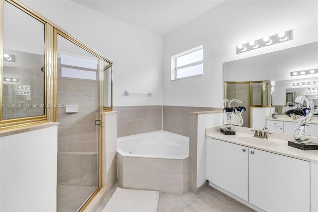 2819 Augusta Ln, Homestead, FL 33035 - bathroom with a garden tub, a stall shower, vanity, and tile patterned floors