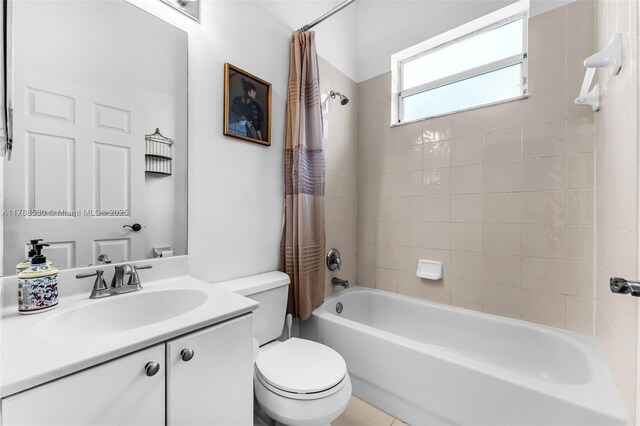 2819 Augusta Ln, Homestead, FL 33035 - full bathroom featuring toilet, shower / bath combination with curtain, and vanity