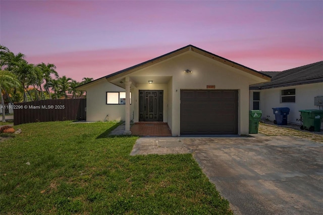 14431 SW 111th Ter, Miami, FL 33186 - ranch-style house with stucco siding, an attached garage, and concrete driveway