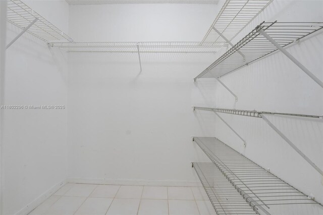 14431 SW 111th Ter, Miami, FL 33186 - walk in closet with tile patterned flooring