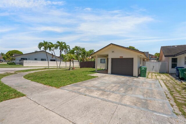 14431 SW 111th Ter, Miami, FL 33186 - single story home with driveway, a garage, and stucco siding