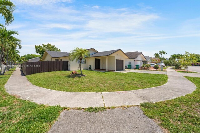 14431 SW 111th Ter, Miami, FL 33186 - single story home with a garage, driveway, and stucco siding