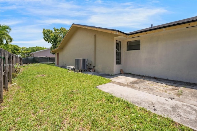 14431 SW 111th Ter, Miami, FL 33186 - view of yard featuring central AC unit