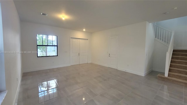 4578 SW 174th Ave, Miramar, FL 33029 - spare room featuring stairway and baseboards