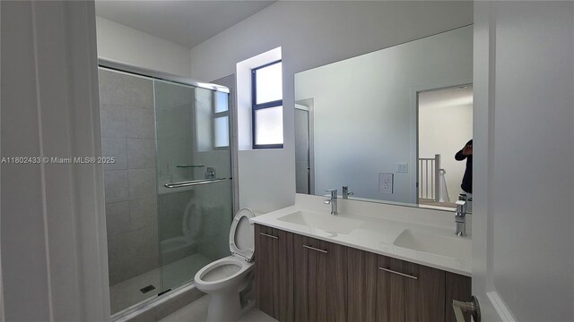 4578 SW 174th Ave, Miramar, FL 33029 - full bathroom with a stall shower, double vanity, and toilet