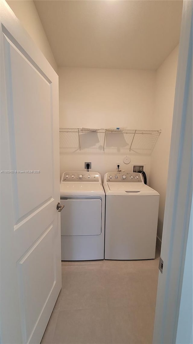 4578 SW 174th Ave, Miramar, FL 33029 - clothes washing area featuring washing machine and dryer