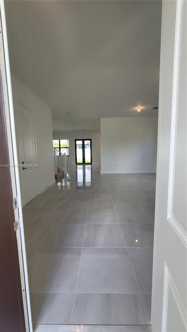 4578 SW 174th Ave, Miramar, FL 33029 - tiled spare room with baseboards
