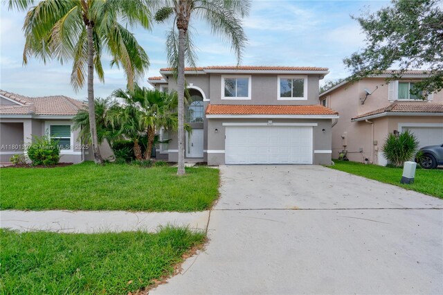 6381 Willoughby Cir, Lake Worth, FL 33463 - mediterranean / spanish-style house featuring stucco siding, an attached garage, driveway, a tiled roof, and a front lawn
