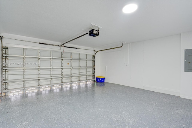 6381 Willoughby Cir, Lake Worth, FL 33463 - garage with a garage door opener and electric panel