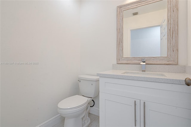 6381 Willoughby Cir, Lake Worth, FL 33463 - half bath with baseboards, toilet, and vanity