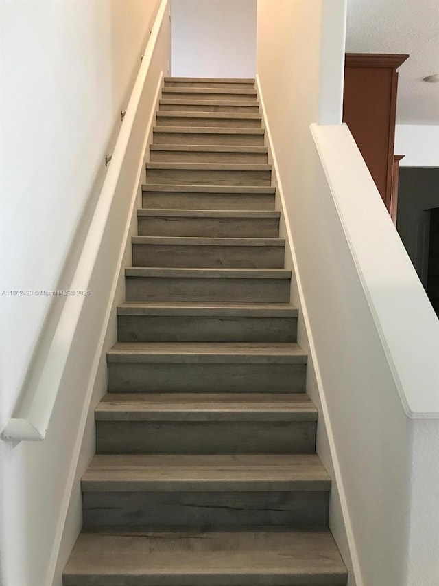 3319 Rodrick Cir, Orlando, FL 32824 - stairs with baseboards