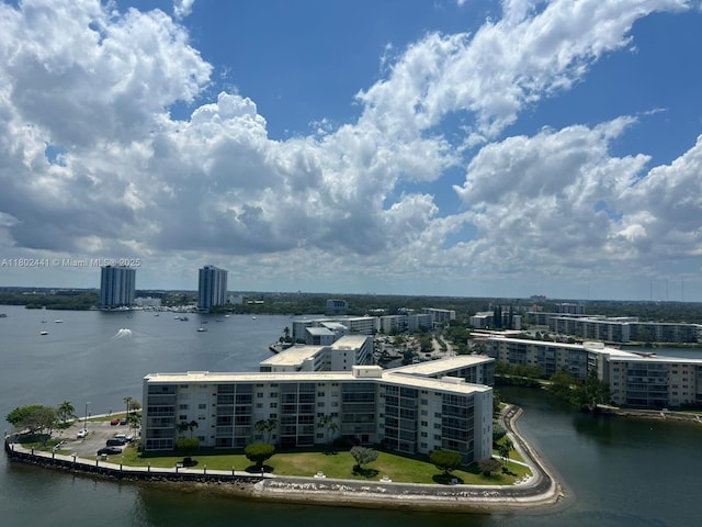 view of urban area featuring a nearby body of water