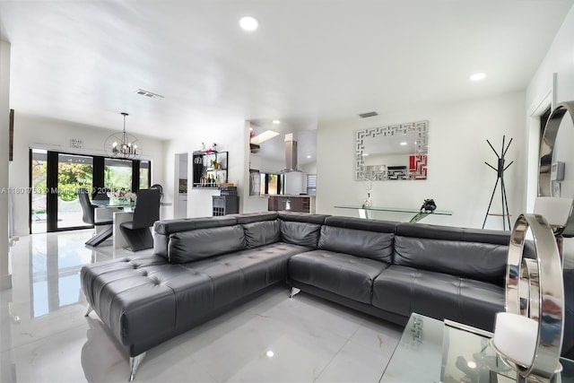 8840 SW 181st Ter, Palmetto Bay, FL 33157 - living area featuring a chandelier, recessed lighting, and light marble finish flooring