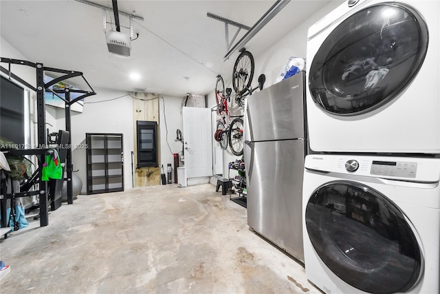 8840 SW 181st Ter, Palmetto Bay, FL 33157 - clothes washing area featuring a garage and estacked washer and dryer