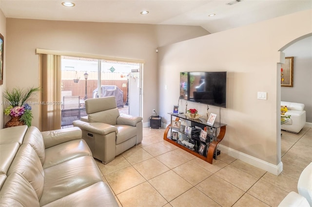 15763 SW 82nd St, Miami, FL 33193 - living area featuring arched walkways, lofted ceiling, light tile patterned floors, baseboards, and recessed lighting