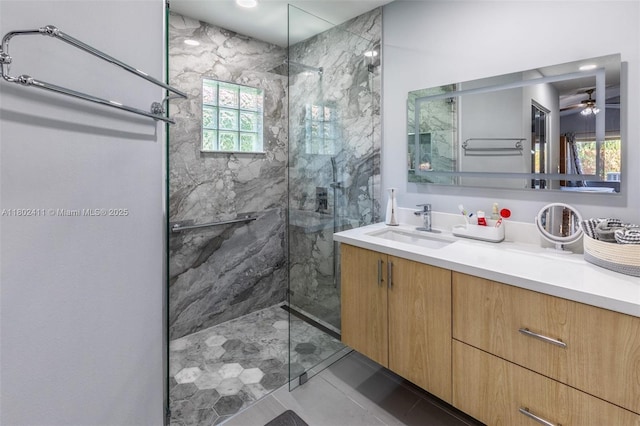 15763 SW 82nd St, Miami, FL 33193 - bathroom with a marble finish shower, vanity, and ceiling fan