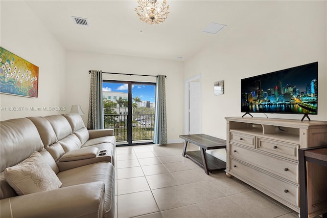 8301 NW 41st St Unit B-303, Doral, FL 33166 - living area featuring light tile patterned floors and a chandelier