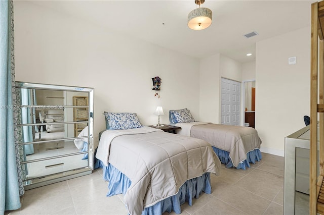 8301 NW 41st St Unit B-303, Doral, FL 33166 - bedroom featuring tile patterned flooring and a closet