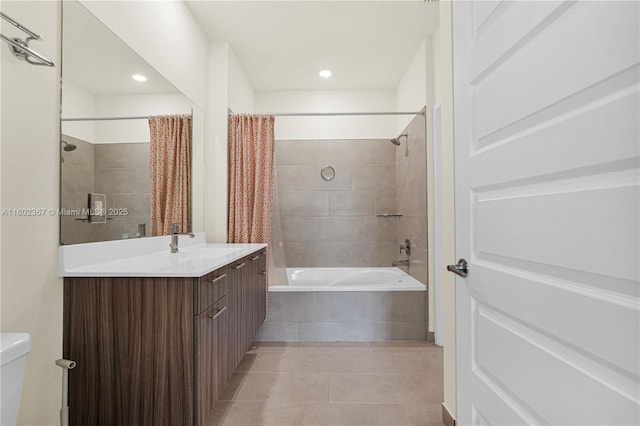 8301 NW 41st St Unit B-303, Doral, FL 33166 - bathroom featuring tile patterned flooring, vanity, toilet, tiled shower / bath combo, and recessed lighting