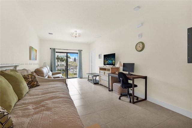 8301 NW 41st St Unit B-303, Doral, FL 33166 - living area featuring a desk, tile patterned flooring, baseboards, and electric panel