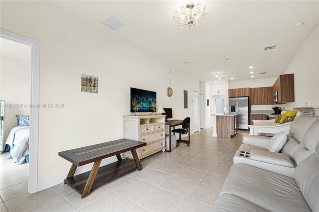 8301 NW 41st St Unit B-303, Doral, FL 33166 - living room featuring light tile patterned flooring, a chandelier, recessed lighting, and baseboards