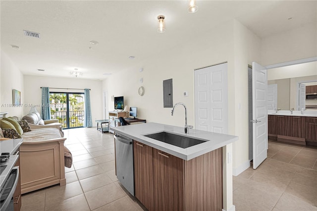 8301 NW 41st St Unit B-303, Doral, FL 33166 - kitchen featuring a sink, stainless steel appliances, open floor plan, light tile patterned floors, and light countertops