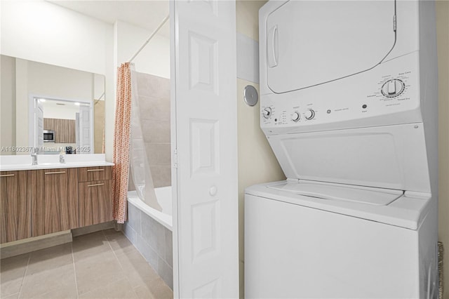8301 NW 41st St Unit B-303, Doral, FL 33166 - washroom featuring estacked washer and dryer and light tile patterned floors